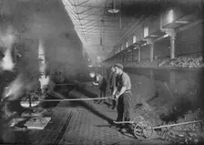 Drawing retorts by hand, South Metropolitan Gasworks, Peckham, London, 1903 (1903)