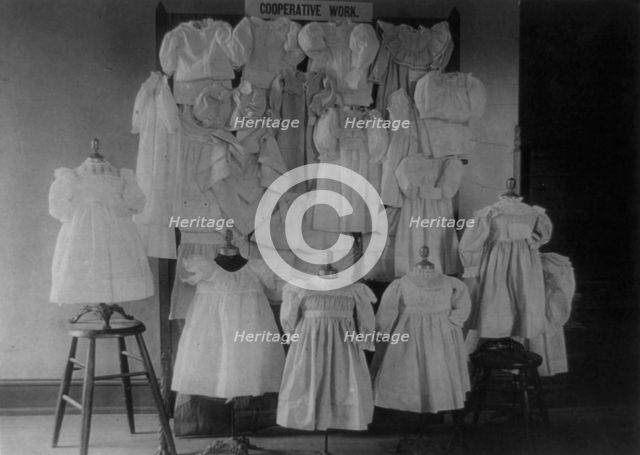 Dresses, possibly made by students in a Washington, D.C. school, on display, (1899?). Creator: Frances Benjamin Johnston.