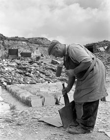 Dressing slate at Trebarwith Slate Quarry, Cornwall, 1959. Creator: Michael Walters