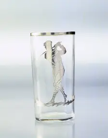 Drinking glass with silver overlay of golfer, United States, c1920. Creator: Unknown