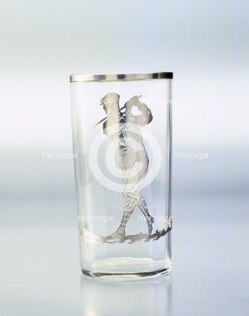 Drinking glass with silver overlay of golfer, United States, c1920. Creator: Unknown.
