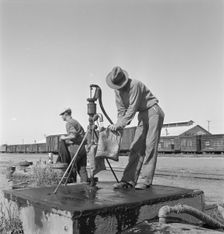 Drinking water for the whole town, also for the..., Tulelake, Siskiyou County, California, 1939. Creator: Dorothea Lange