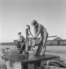 Drinking water for the whole town, also for the..., Tulelake, Siskiyou County, California, 1939. Creator: Dorothea Lange