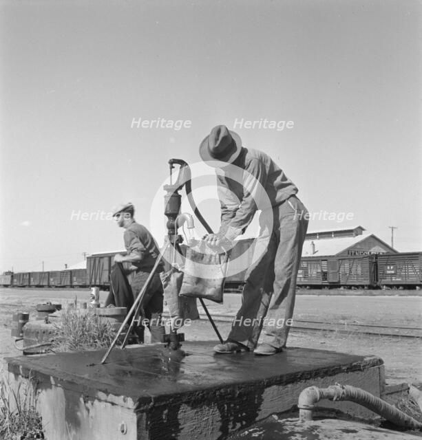 Drinking water for the whole town, also for the..., Tulelake, Siskiyou County, California, 1939. Creator: Dorothea Lange.