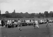 Drivers running to their cars at the start of a race at Crystal Palace, London, 1939. Artist: Bill Brunell