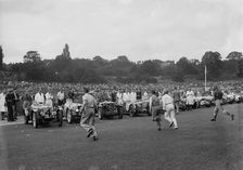 Drivers running to their cars at the start of a race at Crystal Palace, London, 1939. Artist: Bill Brunell