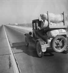 Drought refugee's car on U.S. Highway 99 between Bakersfield and Famoso, California, 1936. Creator: Dorothea Lange