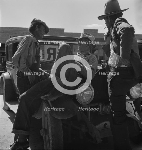 Drought refugees waiting for relief checks, Calipatria, California, 1937. Creator: Dorothea Lange.