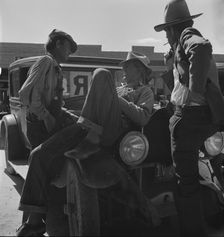 Drought refugees waiting for relief checks, Calipatria, California, 1937. Creator: Dorothea Lange