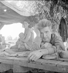 Drought refugees from Oklahoma camping by the roadside, Blythe, California, 1936. Creator: Dorothea Lange