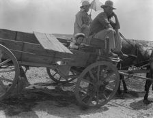 Drought-stricken farmer and family near Muskogee, Oklahoma, 1936. Creator: Dorothea Lange