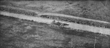 Du tardenois a la Picardie; premiere ligne dans le fosse d'une route, devant Fere-en..., 1918. Creator: Unknown