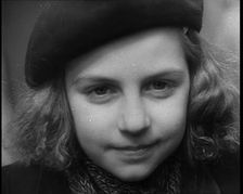 Dutch Refugee Smiling To the Camera at a Reception Centre in the United Kingdom, 1940. Creator: British Pathe Ltd