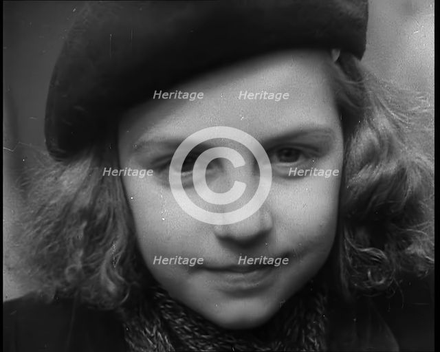 Dutch Refugee Smiling To the Camera at  a Reception Centre in the United Kingdom, 1940. Creator: British Pathe Ltd.