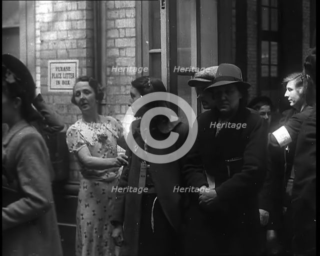 Dutch Refugees Entering a Reception Centre in the United Kingdom, 1940. Creator: British Pathe Ltd.