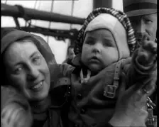 Dutch Refugees Fleeing Aboard Ships in the Netherlands. A Woman Holding Her Baby Is..., 1940. Creator: British Pathe Ltd