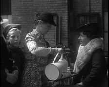 Dutch Refugees Having Tea at a Reception Centre in the United Kingdom, 1940. Creator: British Pathe Ltd