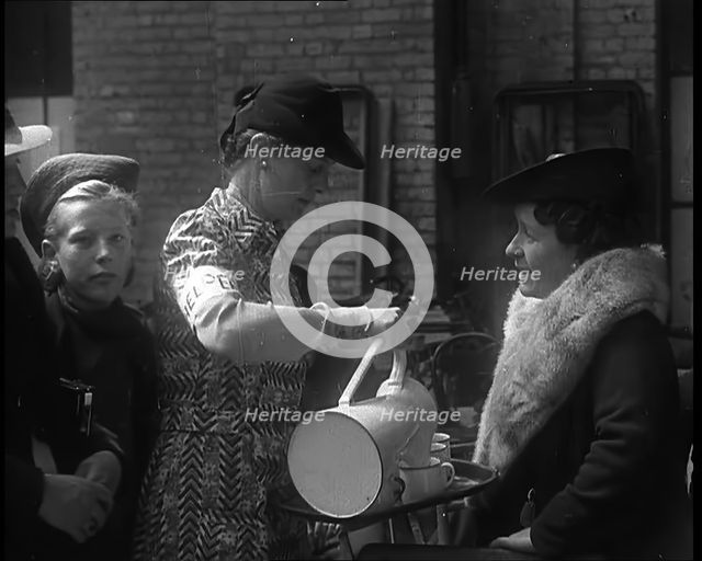 Dutch Refugees Having Tea at  a Reception Centre in the United Kingdom, 1940. Creator: British Pathe Ltd.