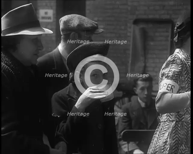 Dutch Refugees Having Tea at a Reception Centre in the United Kingdom, 1940. Creator: British Pathe Ltd.