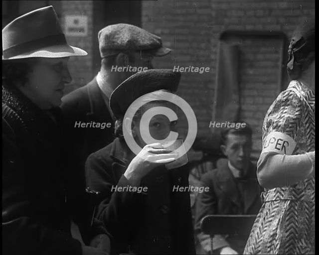 Dutch Refugees Having Tea at a Reception Centre in the United Kingdom, 1940. Creator: British Pathe Ltd.