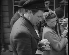Dutch Refugees Receiving Food at a Reception Centre in the United Kingdom, 1940. Creator: British Pathe Ltd