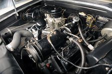 Dual Ghia 1957. Artist: Simon Clay