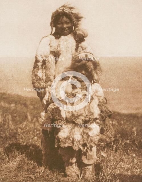 Duck-Skin Parkas, Nunivak, 1928. Creator: Edward Sheriff Curtis.