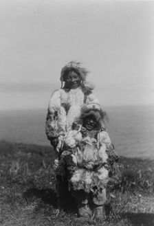 Duck-skin parkas, Nunivak, c1929. Creator: Edward Sheriff Curtis