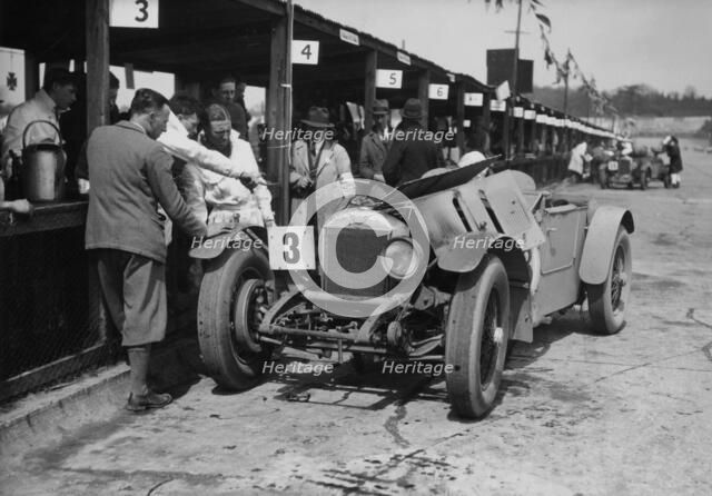 Dudley Froy with the 4.5 litre Invicta S type, at Brooklands, Surrey, 1931. Artist: Unknown