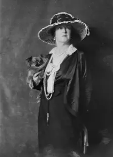 Duff-Gordon, Lady, with dog, portrait photograph, not before 1916. Creator: Arnold Genthe