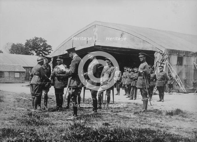 Duke of Connaught decorating a Belgian, 3 Jul 1918. Creator: Bain News Service.