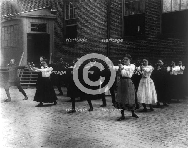 Dumbbell exercises, (1899?). Creator: Frances Benjamin Johnston.