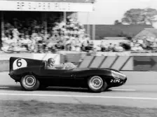 Duncan Hamilton driving a Jaguar D type, RAC Tourist Trophy, Goodwood, Sussex, 1958. Creator: Unknown