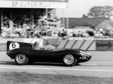 Duncan Hamilton driving a Jaguar D type, RAC Tourist Trophy, Goodwood, Sussex, 1958. Creator: Unknown