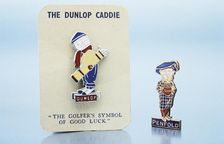 Dunlop caddie brooch and Penfold pin, British, 1920s
