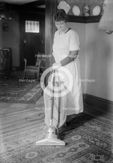 Dunlap vacuuming, between c1915 and c1920. Creator: Bain News Service.