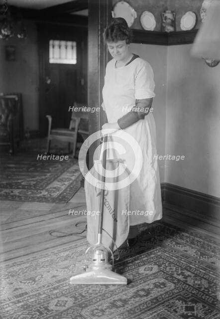 Dunlap vacuuming, between c1915 and c1920. Creator: Bain News Service.