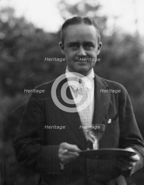 Dunning, Mr., standing outdoors, 1925 July 9. Creator: Arnold Genthe.