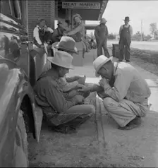 Dust bowl farmers of west Texas in town, 1937. Creator: Dorothea Lange