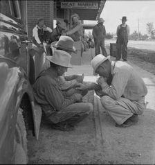 Dust bowl farmers of west Texas in town, 1937. Creator: Dorothea Lange