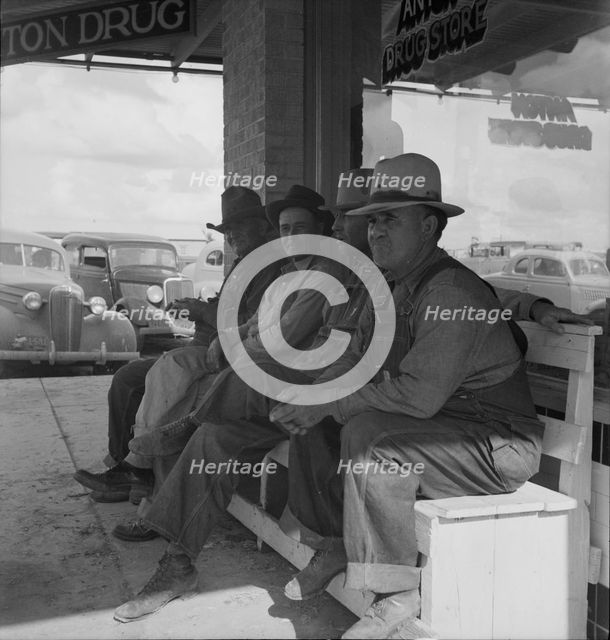 Dust bowl farmers of west Texas in town, 1937. Creator: Dorothea Lange.