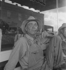 Dust bowl farmers of west Texas in town, 1937. Creator: Dorothea Lange