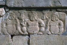 Dwarf figures on a building in the Buddhist city of Anuradhapura