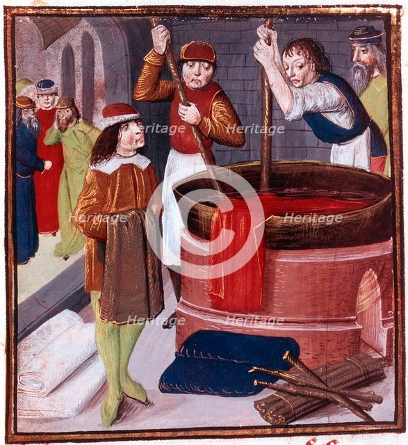 Dyers immersing bolt of cloth in vat of dye placed over a fire, 15th century. Artist: Unknown