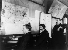 E.C. Heasley, Jules A. Rodier and Maj. Montgomery in the telegraph room in the White House..., 1898. Creator: Frances Benjamin Johnston
