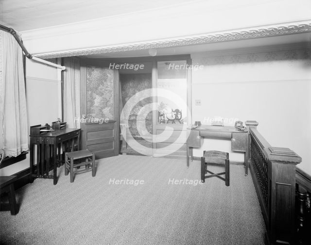 E.M. Bigsby Co. show rooms, private office from balcony, between 1900 and 1915. Creator: Unknown.