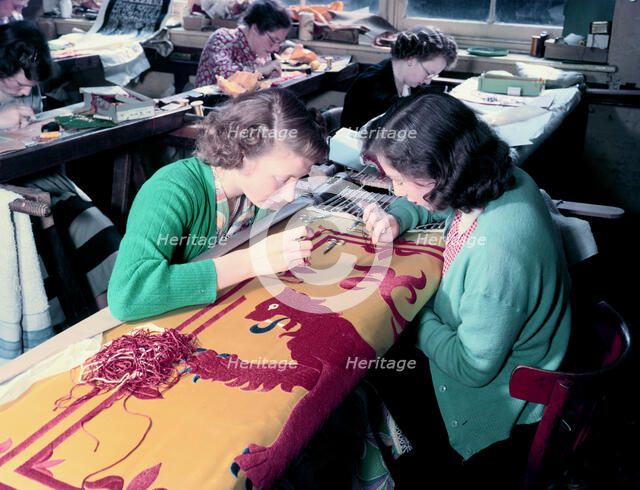 Embroidering the Royal Standard of Scotland used at the coronation of Queen Elizabeth II, 1953. Creator: Arthur Charles Kirby Ware.