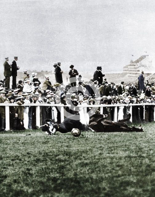 Emily Davison throwing herself in front of the King's horse during the Derby, Epsom, Surrey, 1913. Artist: Unknown.