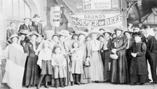 Emmeline Pankhurst at a railway station on a campaign tour of the country, 1911
