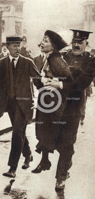 Emmeline Pankhurst arrested by Superintendent Rolfe outside Buckingham Palace, London, May 1914. Artist: Unknown